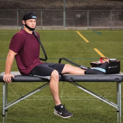 Game Ready ankle wrap connected to cold compression therapy system