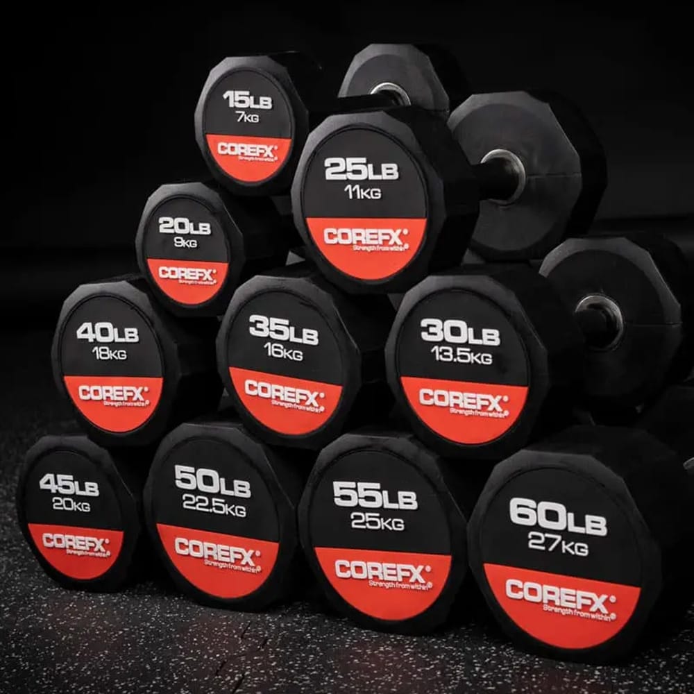 CoreFX rubber dumbbells in multiple weights displayed togetherCoreFX rubber dumbbells in multiple weights displayed together