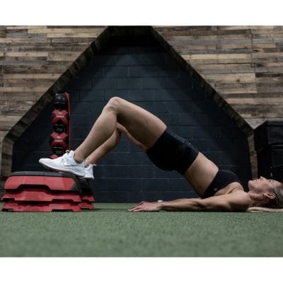 Adjustable aerobic step platform in home gym setting