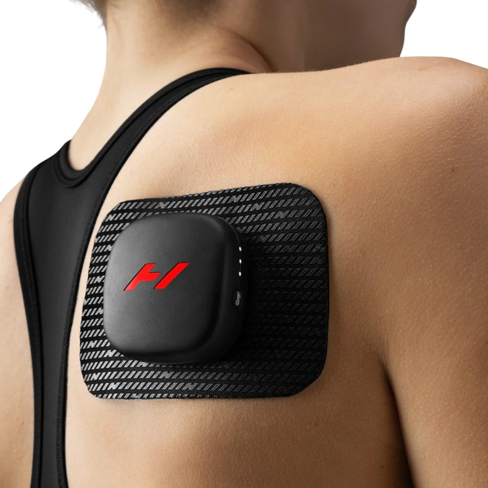 Person using Hyperice Venom Go on the upper back and shoulder for targeted muscle relief