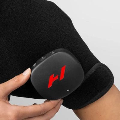Close-up of Hyperice Venom 2 Shoulder control pod showing heat and vibration settings