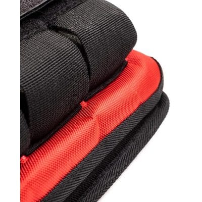 Close-up view of CoreFX Pro weighted vest with several weight bars partially removed