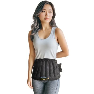 Recov Wrap placed around the abdomen for menstrual discomfort and gentle heat relief