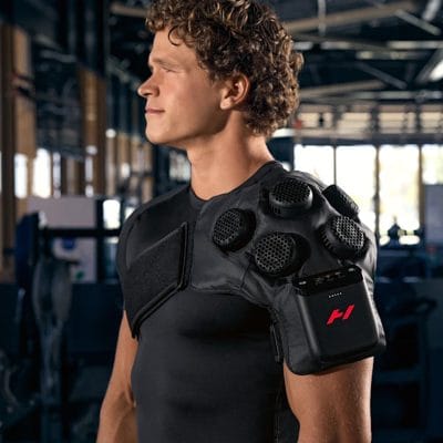 Hyperice X2 Shoulder hot and cold therapy device positioned on the shoulder