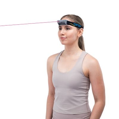Close-up of head-mounted laser used for cervical joint position error testing in a rehabilitation clinic.