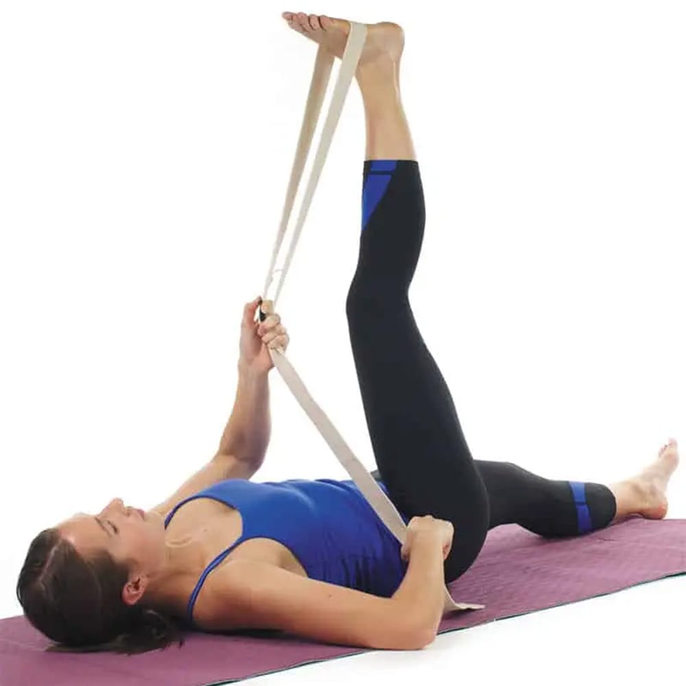 Person using Concorde Yoga Strap for hamstring stretch in yoga session